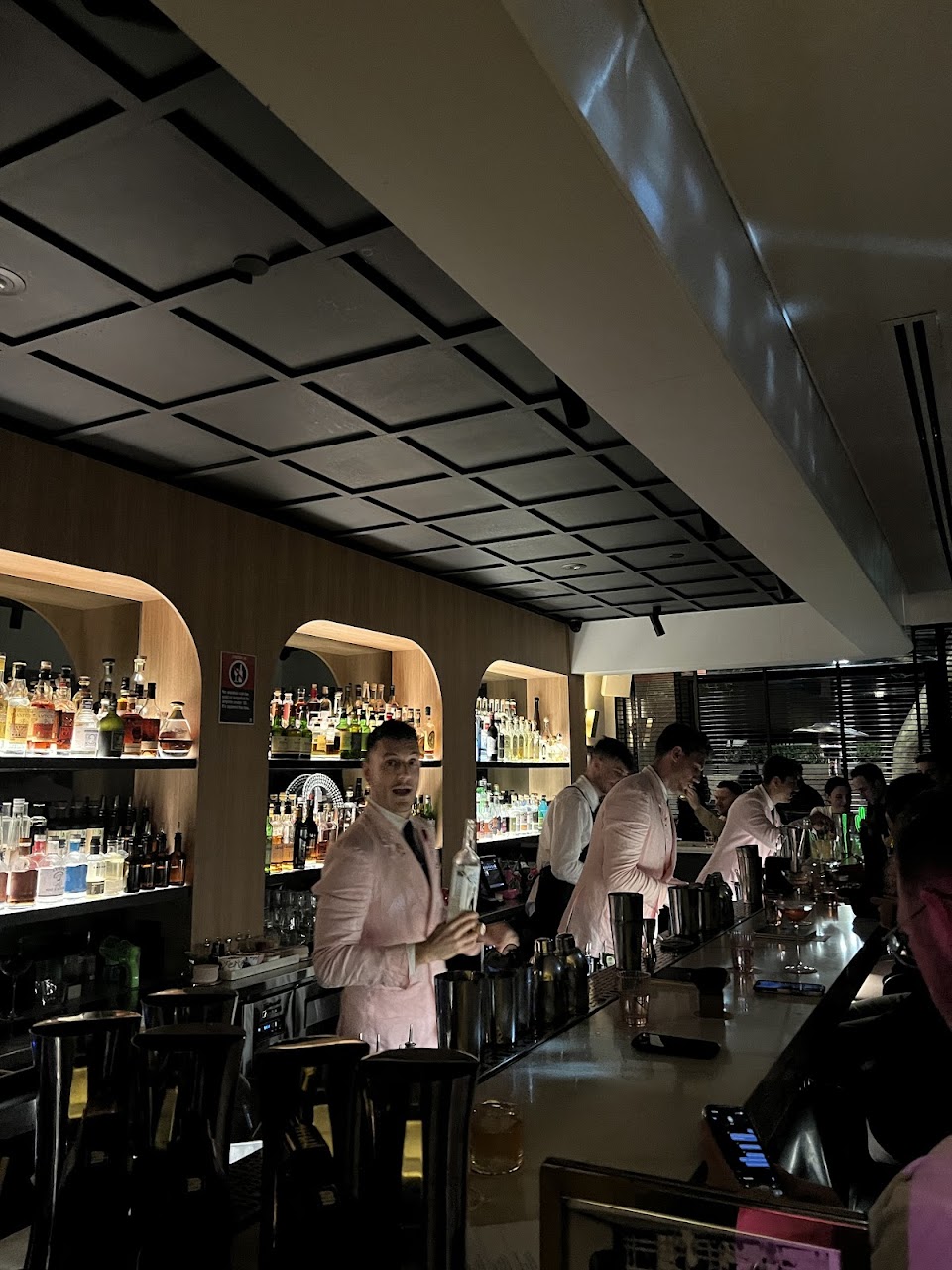 Maybe Sammy bar team working behind the counter